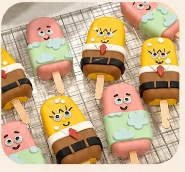 Character-decorated cakesicles on sticks